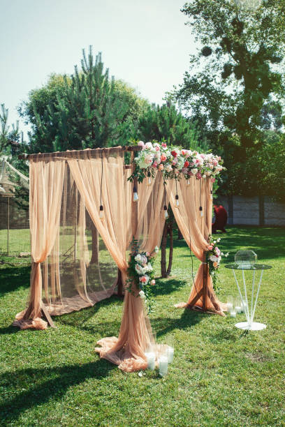 istock Decorated weddig arch in the garden. 1286675943