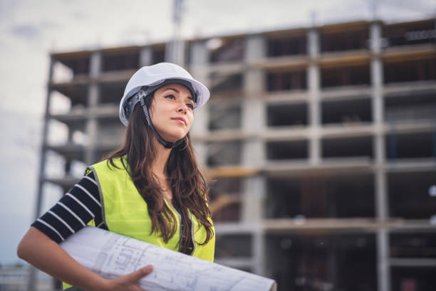 istock Portrait of female architect on construction site. 1286677297