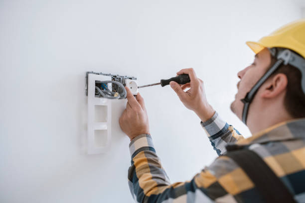 istock An electrician puts contacts on new construction site building. 1286677331