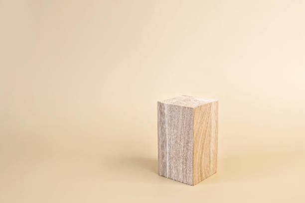 istock Natural wooden stand for presentation and exhibitions on pastel background. Abstract empty podium for organic cosmetic products. Minimal style. 1286678353