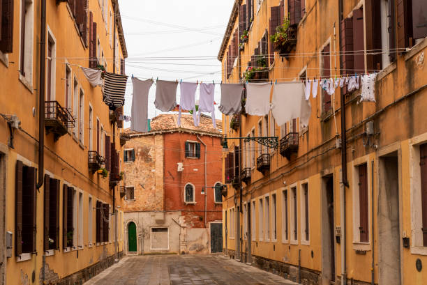 istock Street with laundry hanging out in Venice, Italy 1286678646