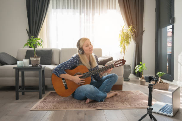 istock Playing Music Lessons Recording for Social Network. 1286681377