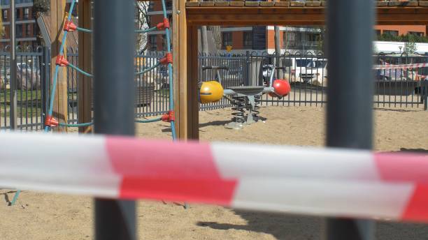 istock Caution Tape on Empty Playground Closed due to Coronavirus Epidemic Quarantine 1286692362
