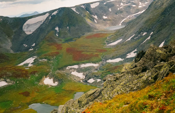 istock Nature is altai in spring. Melted snow in mountains. 1286692567
