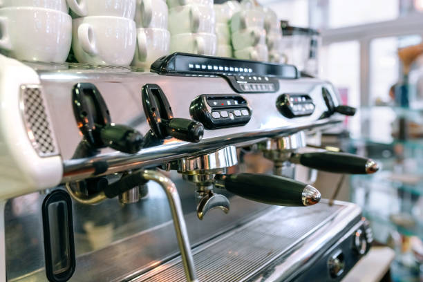 istock Professional coffee maker in a coffee shop 1286692957