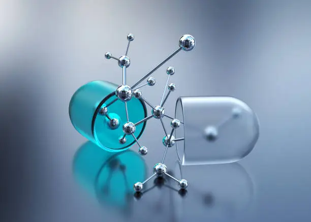 Photo of Pill with molecular structure