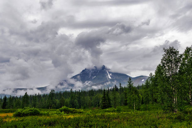 Clouded Mount Manaraga in the Subpolar Urals on a rainy day