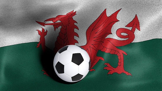 3D rendering of the flag of Wales with a soccer ball