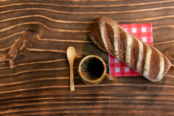 istock coffee served in mug and australian bread on wood 1286696066