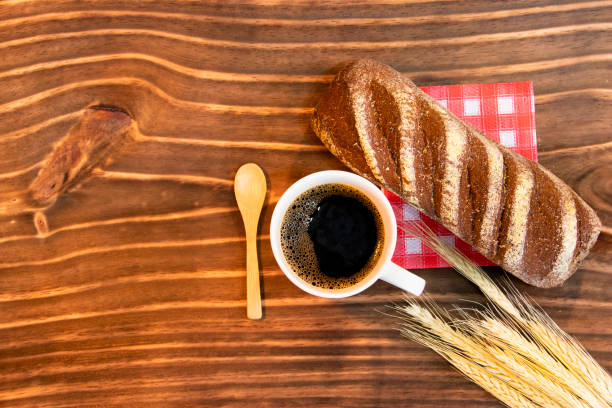istock coffee served in mug and australian bread on wood 1286697164