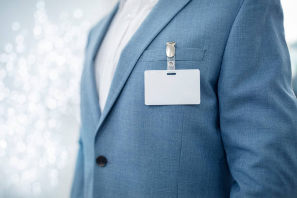 Blank security name tag on businessman suit pocket