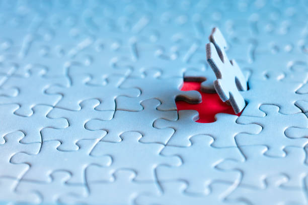 The last piece of jigsaw puzzle concept for solution and completion The last piece of the jigsaw puzzle concept for solution and completion comprehensive stock pictures, royalty-free photos & images