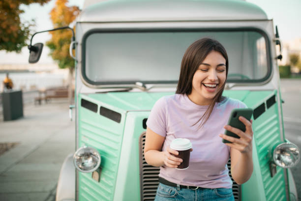 istock Happy young Caucasian woman using a smart phone 1286700183