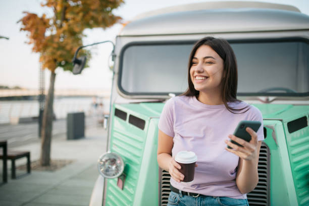 istock Happy young Caucasian woman using a smart phone 1286700201
