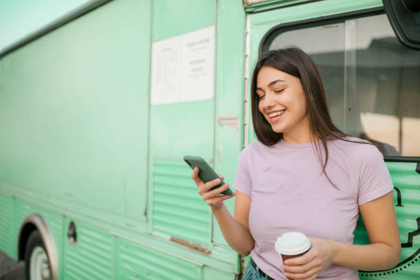 istock Happy young Caucasian woman using a smart phone 1286700206