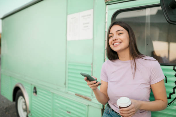 istock Happy young Caucasian woman using a smart phone 1286700290