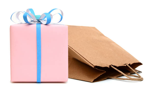 A gift wrapping box with paper bag on white background