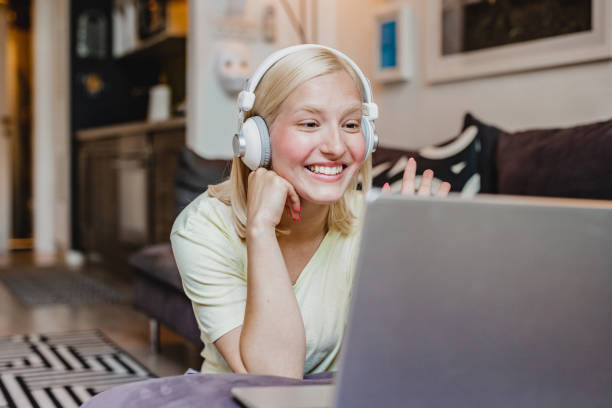 istock Young woman is communicating via video call at home 1286710184
