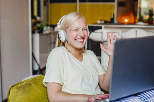 istock Young woman is communicating via video call at home 1286710359