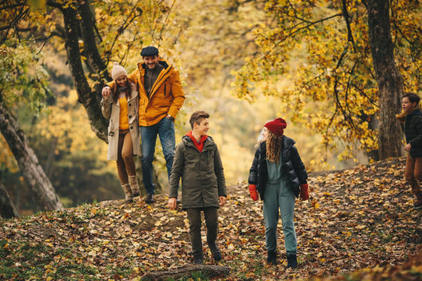 istock Parents with their children walk in nature. 1286713139