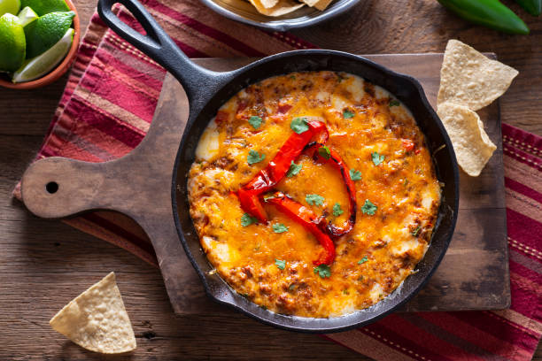 Melted Cheese Queso Fundido with Chorizo in a Cast Iron Skillet cheese dip stock pictures, royalty-free photos & images