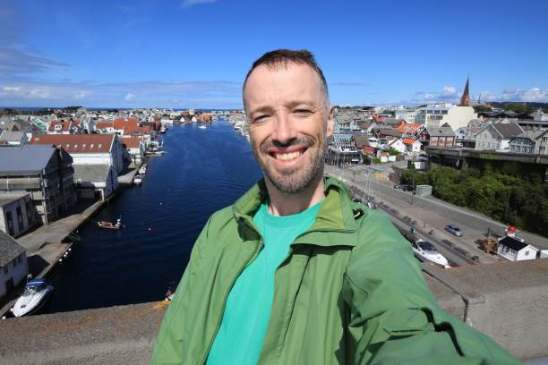 Haugesund traveler selfie Selfie in Norway city of Haugesund. Male adult traveler. haugaland photos stock pictures, royalty-free photos & images