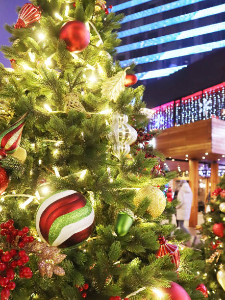 istock Christmas tree on the street with new year decorations. New Year celebration. Selective soft focus. Background for postcards. 1286722889
