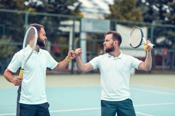 istock Males Determined To Win Tennis Match 1286731893