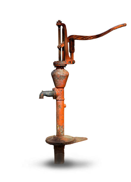 Vintage hand groundwater pump isolated white background