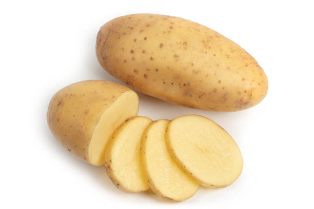 istock Isolated potatoes. raw slice potato vegetables isolated on white background 1286738247