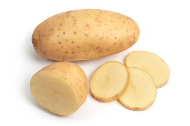 istock Isolated potatoes. Whole potatoe and cut isolated on white background 1286738327