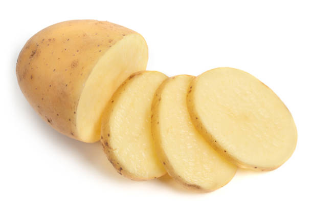 istock Isolated potatoes. raw slice potato vegetables isolated on white background 1286738338
