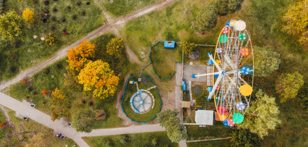 istock Attraction. Ferris wheel attraction. Aerial view. 1286739753
