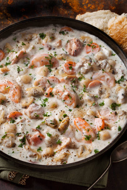 istock Seafood Chowder with Shrimp, Bay Scallops, Clams and Salmon 1286740584