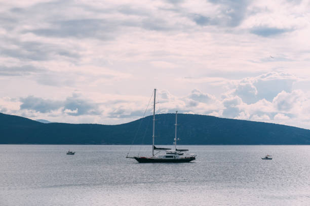 Anchored Yacht and Dramatic Sky