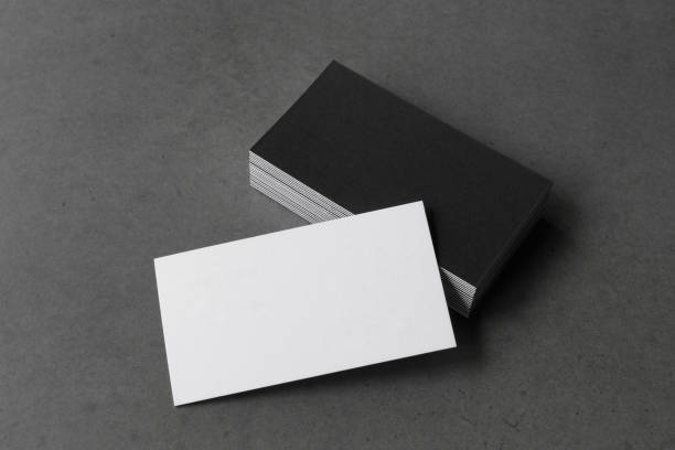 istock Business card on black background. 1286744755