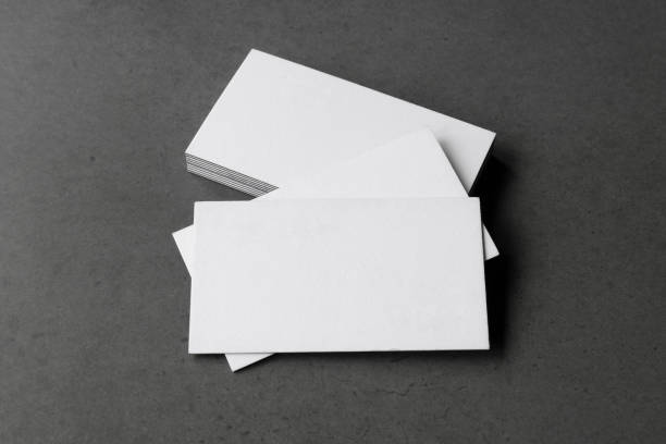 istock Business card on black background. 1286744759