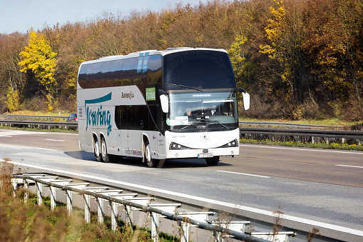 Niagara Falls, ON, Canada - June 30, 2022: A WEGO bus in Niagara Falls, ON, Canada. WEGO is the hop-on, hop-off bus system that connects Niagara Parks attractions and Niagara Falls tourism areas.