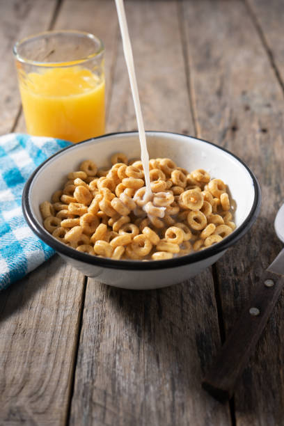 istock Cereal bowl for breakfast on wooden background 1286745040