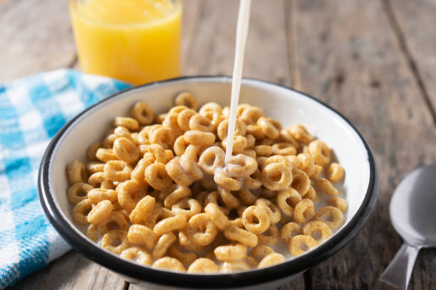 istock Cereal bowl for breakfast on wooden background 1286745846