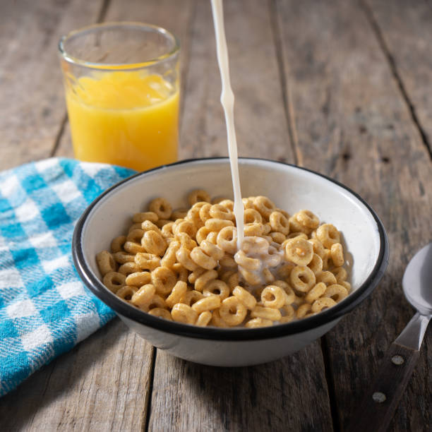 istock Cereal bowl for breakfast on wooden background 1286746173