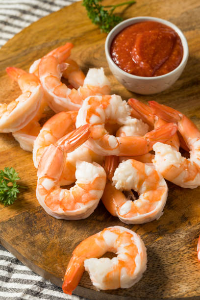 Homemade Boiled Shrimp Appetizer Homemade Boiled Shrimp Appetizer with Cocktail Sauce shrimp cocktail stock pictures, royalty-free photos & images