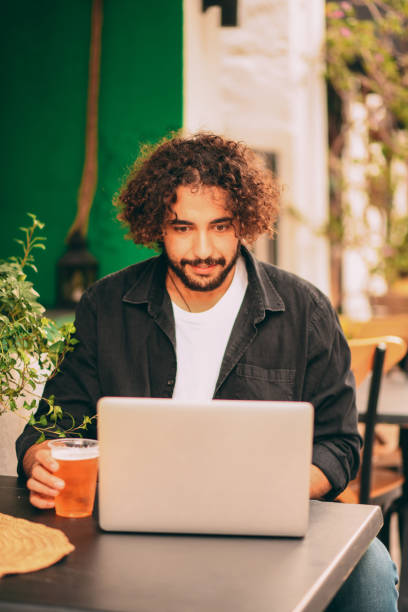istock Handsome Man Having Video Call in Cafe 1286747571