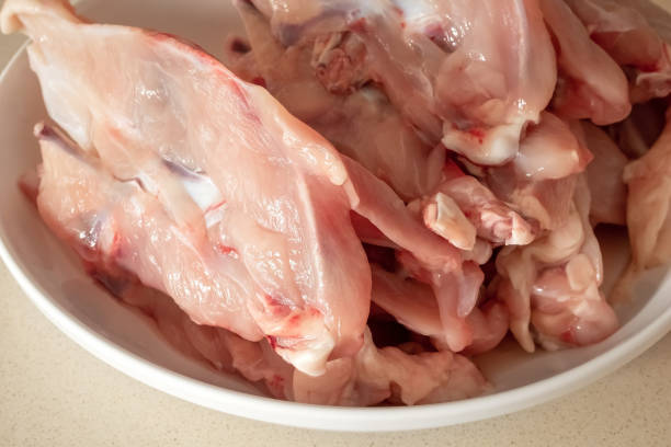 istock Fresh chicken skeletons with meat - ingredient for preparing bone broth 1286749924