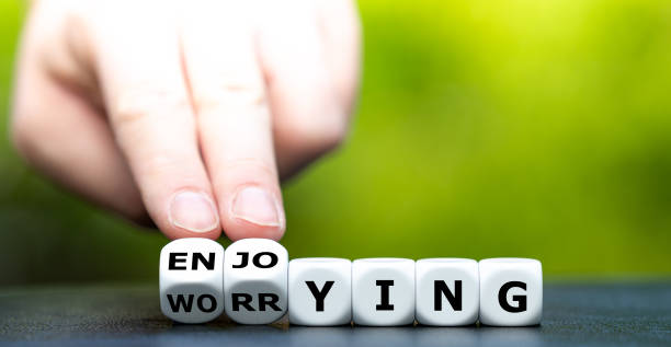 istock Hand turns dice and changes the word 
