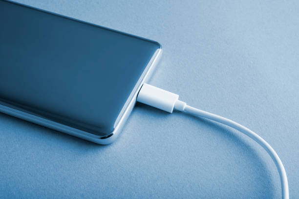 istock Charging a mobile phone connected to electricity for recharging. 1286750830
