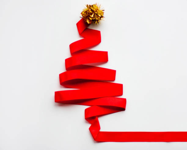 istock Christmas tree made from ribbon isolated on white background 1286751866