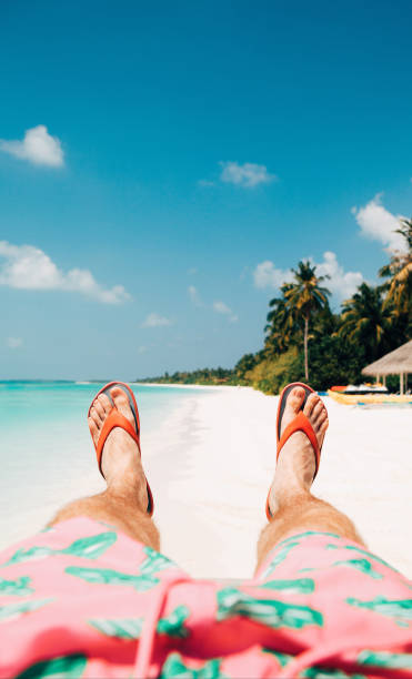 istock Happy vacation on tropical island 1286751938