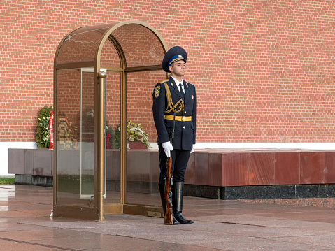 Moscow, Russia - APRIL 20: Military stands in sentry box in guard in honor of grave of the Unknown Soldier and The Eternal Flame on April 20, 2019 in Moscow.