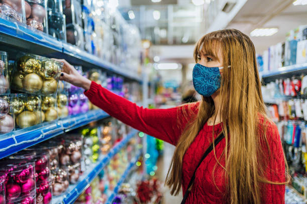 istock Woman buying decorations for Christmas tree 1286755088